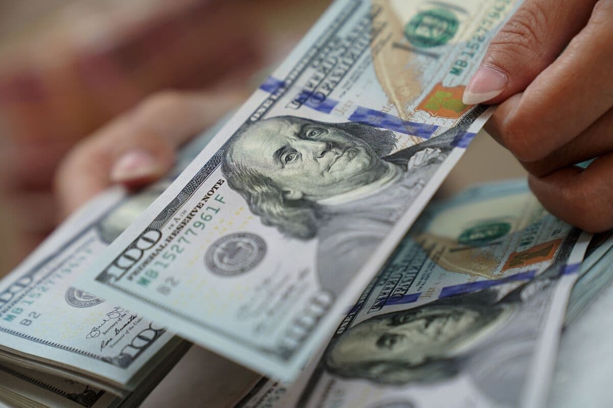 Dollar Hits Lowest Since War Started on Report End Is Near