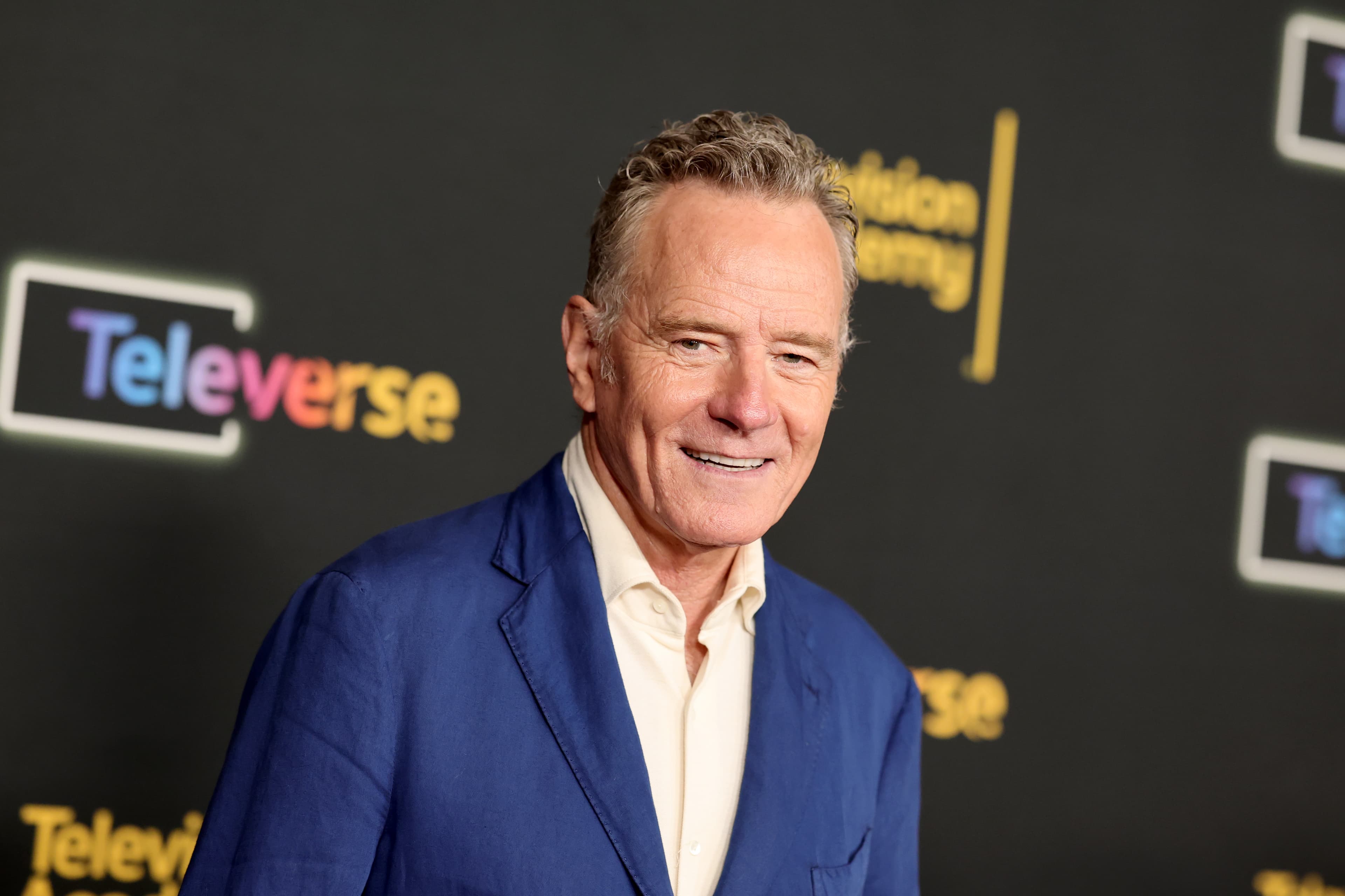 Bryan Cranston Says “Comedy Is Essential Right Now” Amid “Bombardment” Of Constant News Cycle