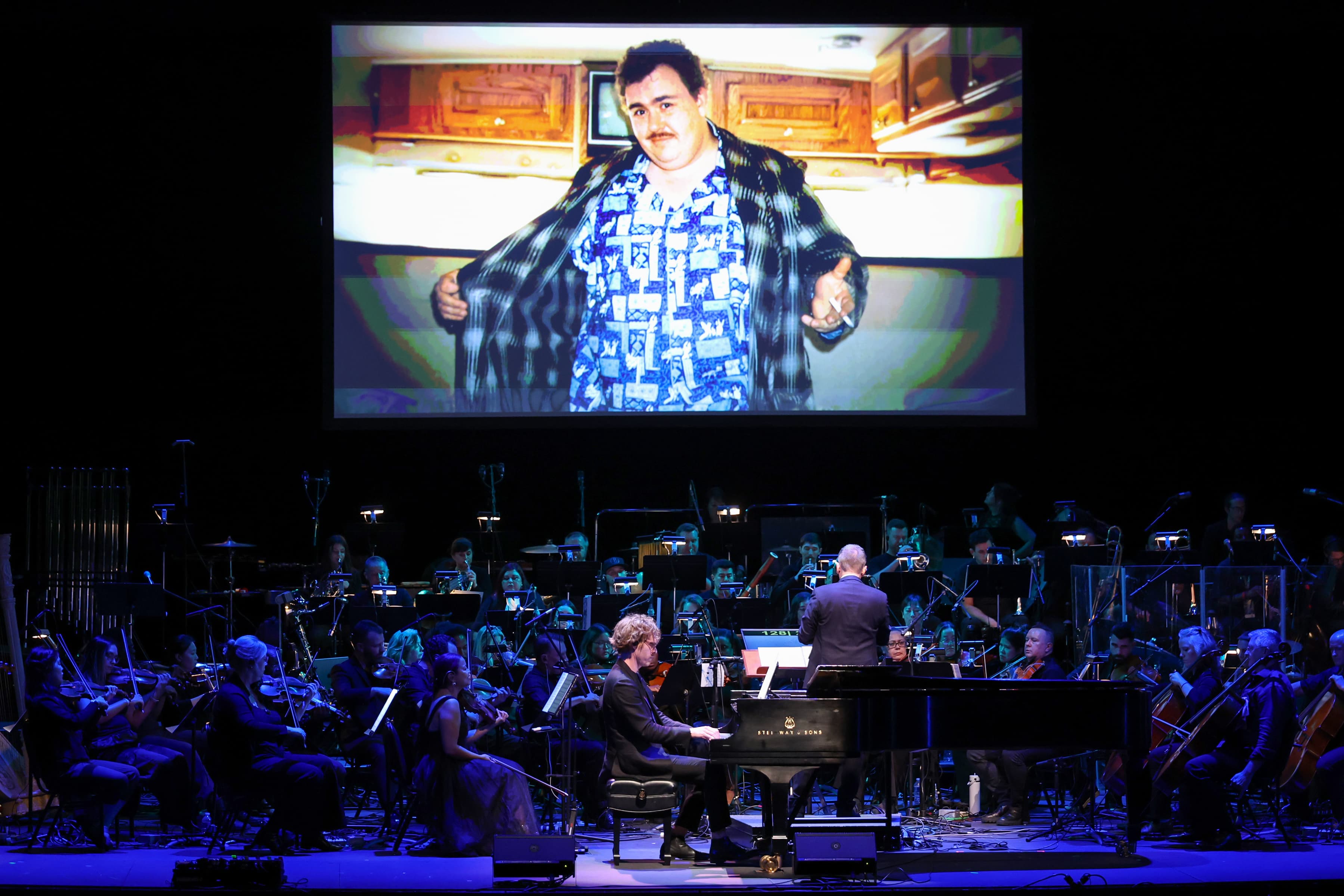 ‘John Candy: I Like Me’ Composer Tyler Strickland On Using French Horn To Depict Comedy Icon “As A Soldier Going Through This Battle Of Life” – Sound & Screen TV