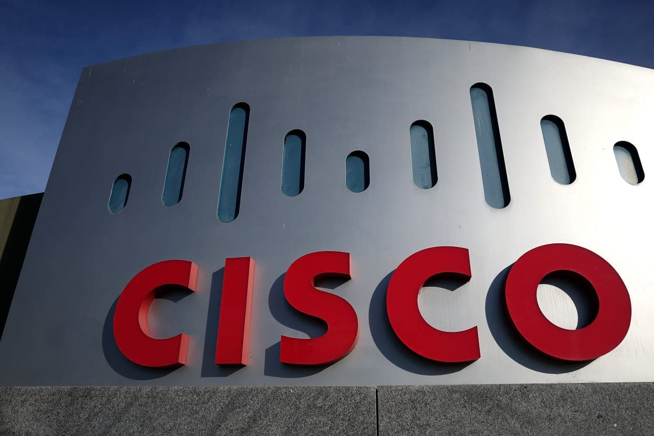 Cisco to cut jobs so it can invest more in AI, and the stock rockets toward a record