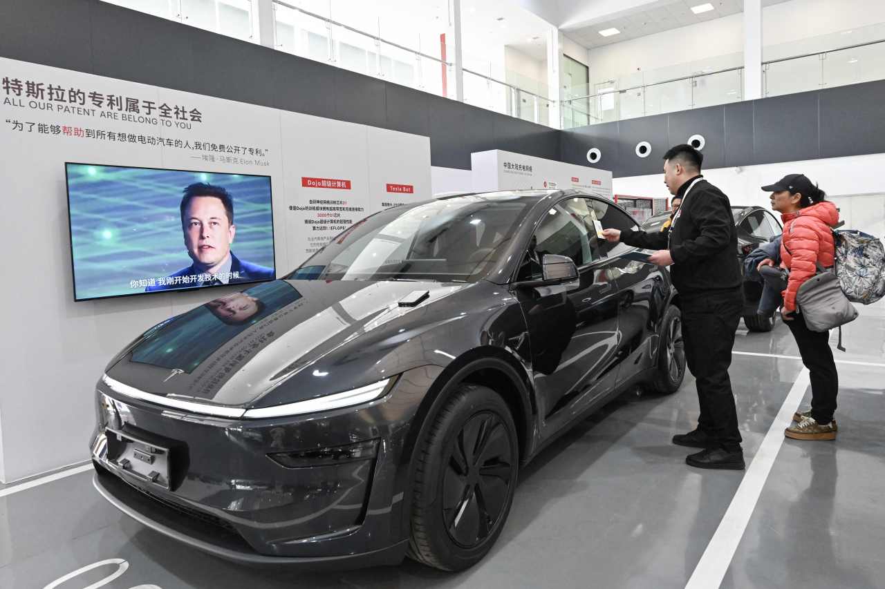 Tesla’s stock rises as investors get a fresh sign that high gas prices are driving EV sales