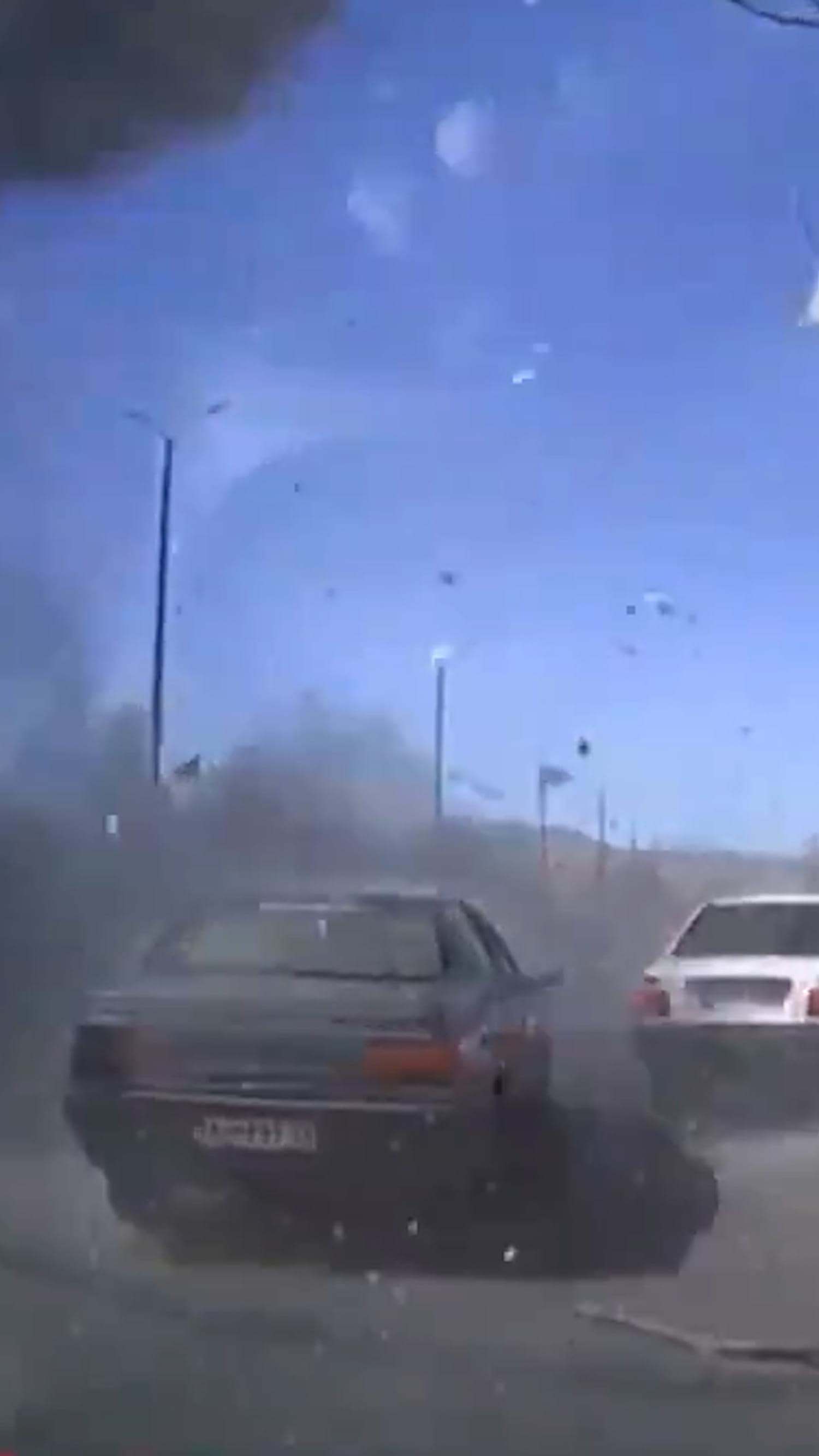 Video shows missiles striking an Iranian neighborhood