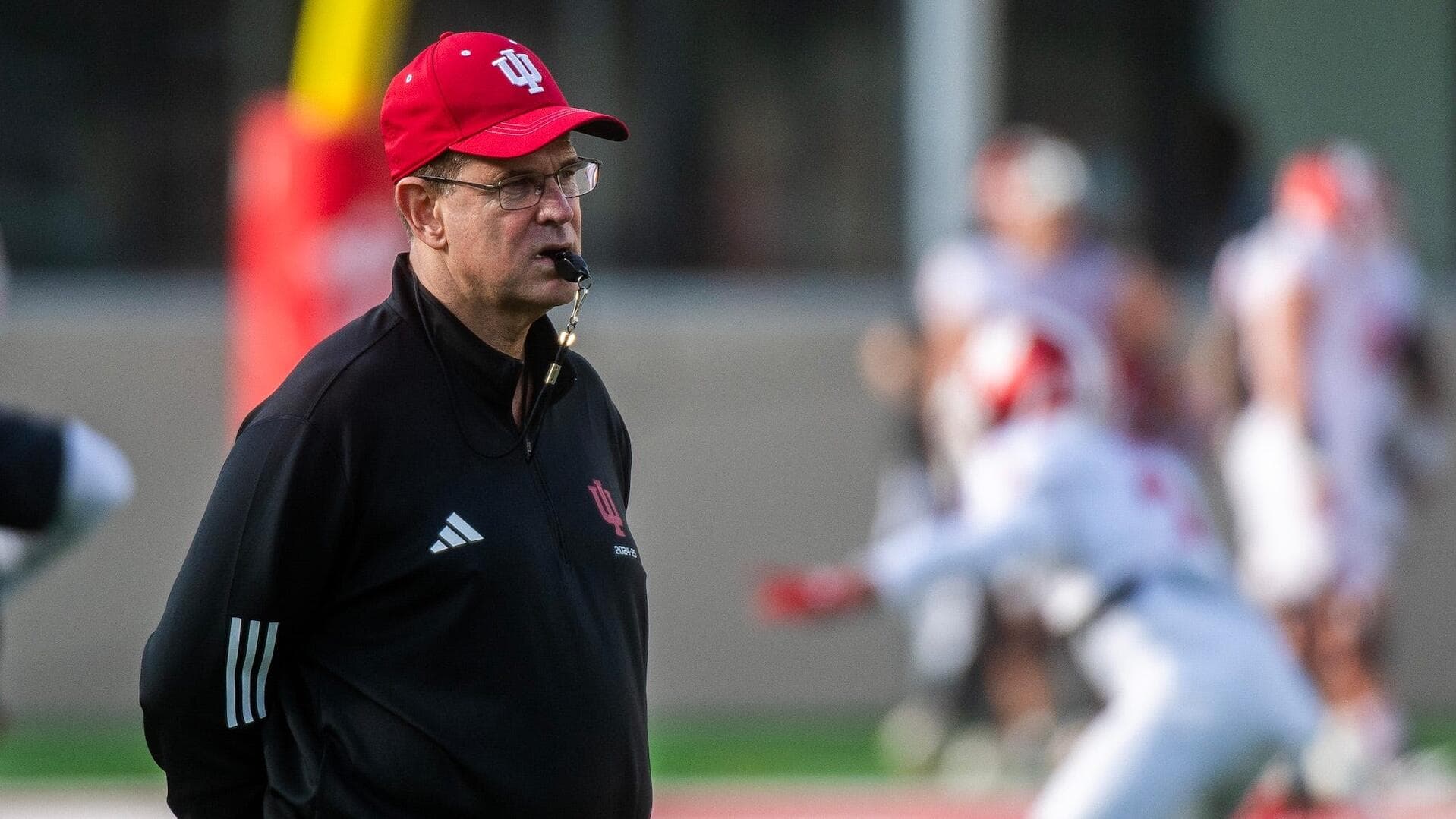 
                        With a wink, Curt Cignetti shrugs off Sonny Dykes' criticism of new Indiana QB Josh Hoover
                    