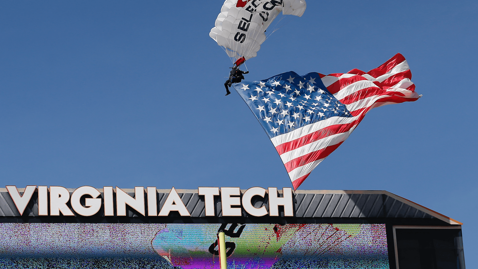 
                        Parachuter crashes into Virginia Tech scoreboard before spring game; no serious injuries reported
                    