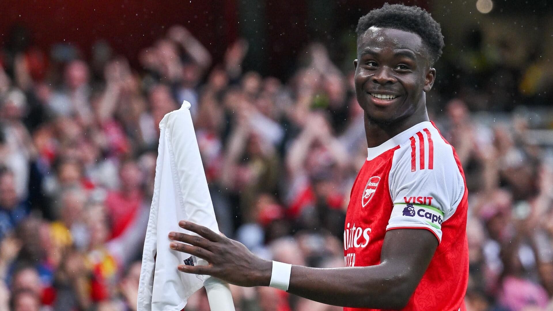 
                        Bukayo Saka eases Arsenal's title tension as Premier League lead extended with comprehensive Fulham win
                    