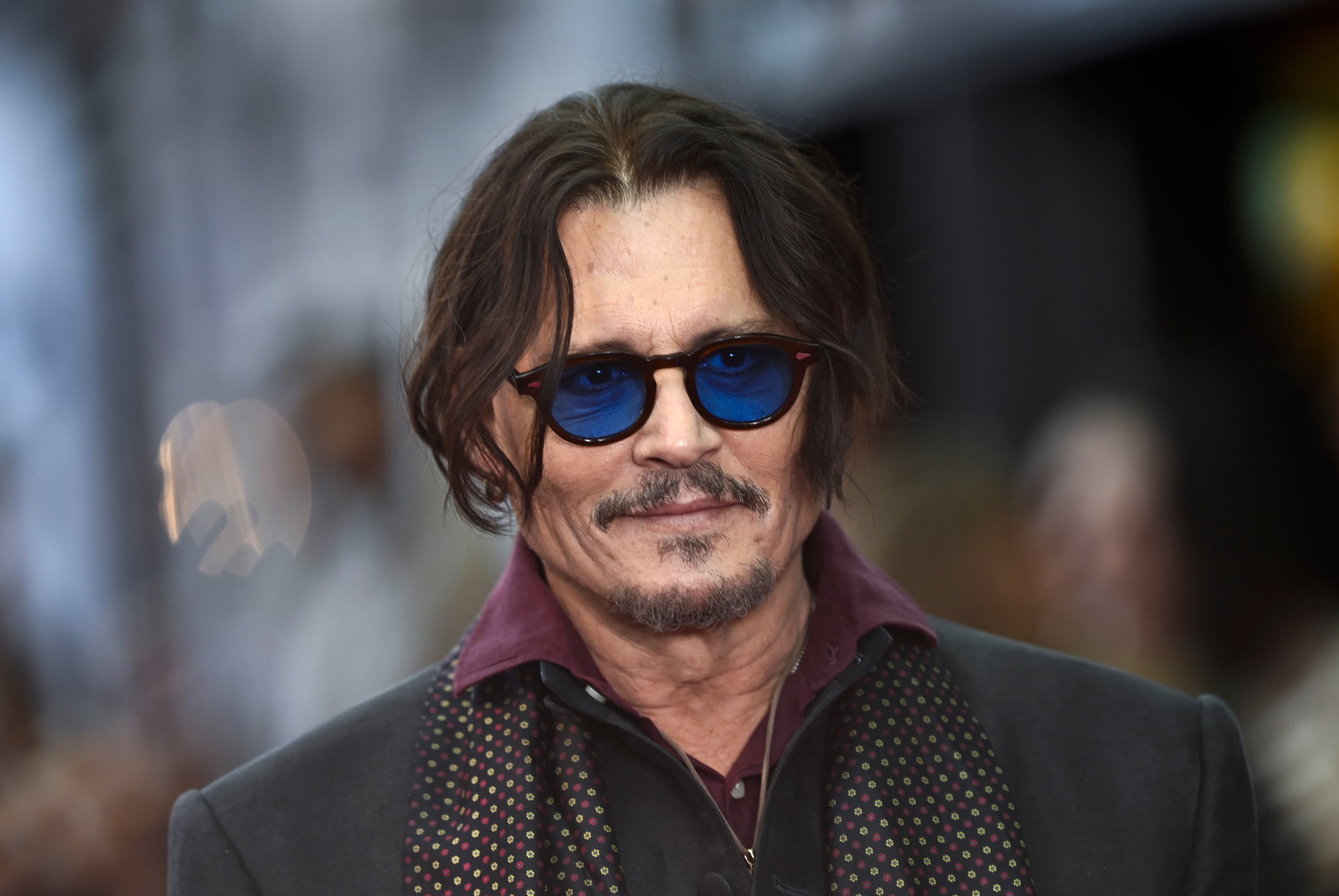 Johnny Depp Earns Huge CinemaCon Applause and Debuts Scrooge Transformation in ‘A Christmas Carol’ First Footage