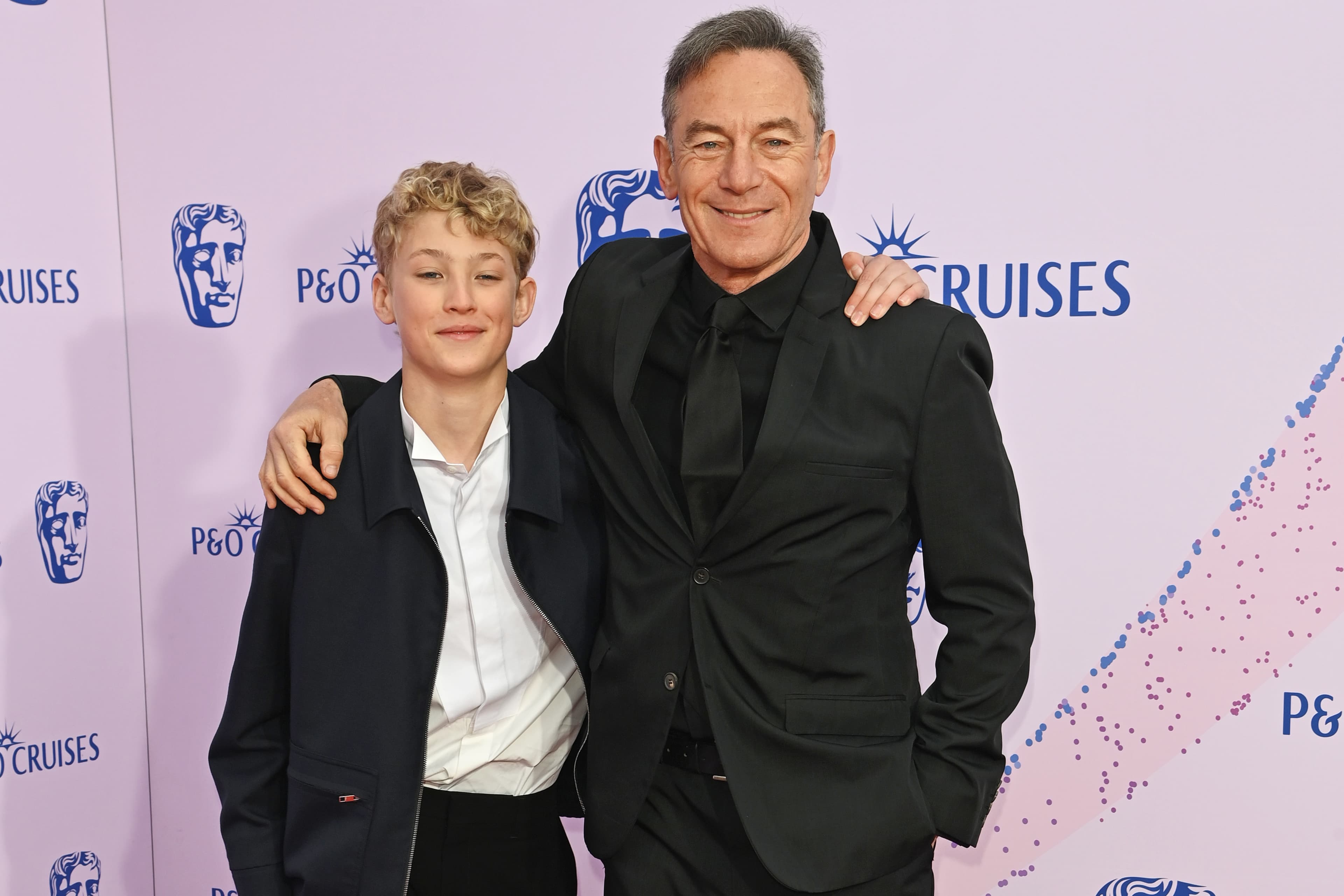 ‘Harry Potter’ Stars Bring the Magic to BAFTA TV Awards as Movie Version’s Lucius Malfoy, Jason Isaacs, Poses With TV’s Draco, Lox Pratt