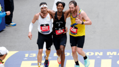 'My instinct was to help him': Runners help exhausted man finish Boston Marathon