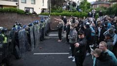 Police pelted with missiles at Henry Nowak protest