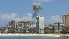 Israeli air strikes hit Lebanese city of Tyre despite Iranian warning to stop attacks