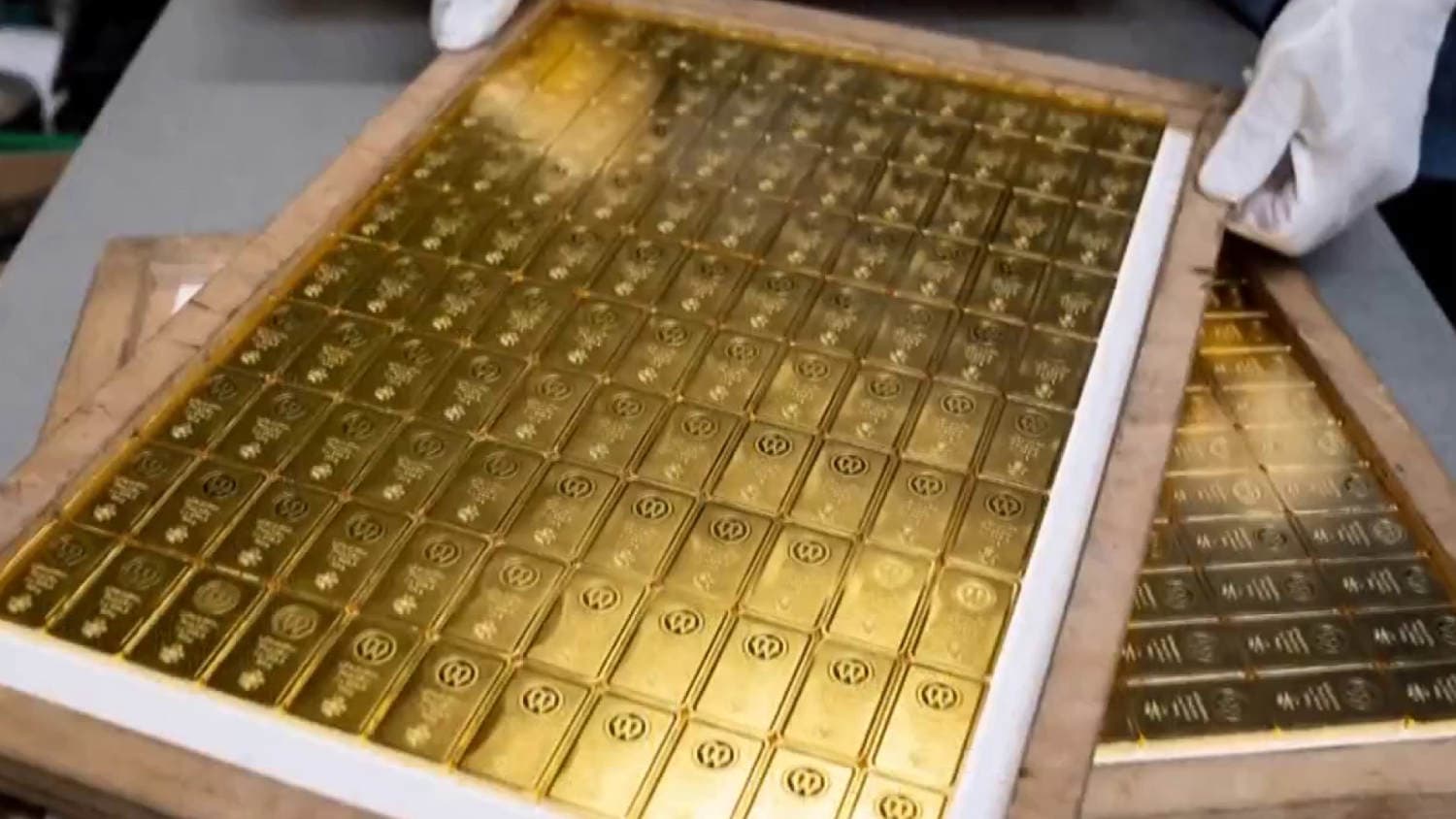 Former CIA officer accused of stashing 300 gold bars in his house
