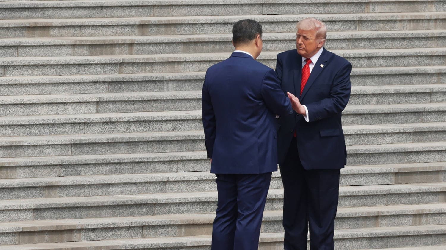Trump shakes hands with Xi at start of historic U.S.-China summit