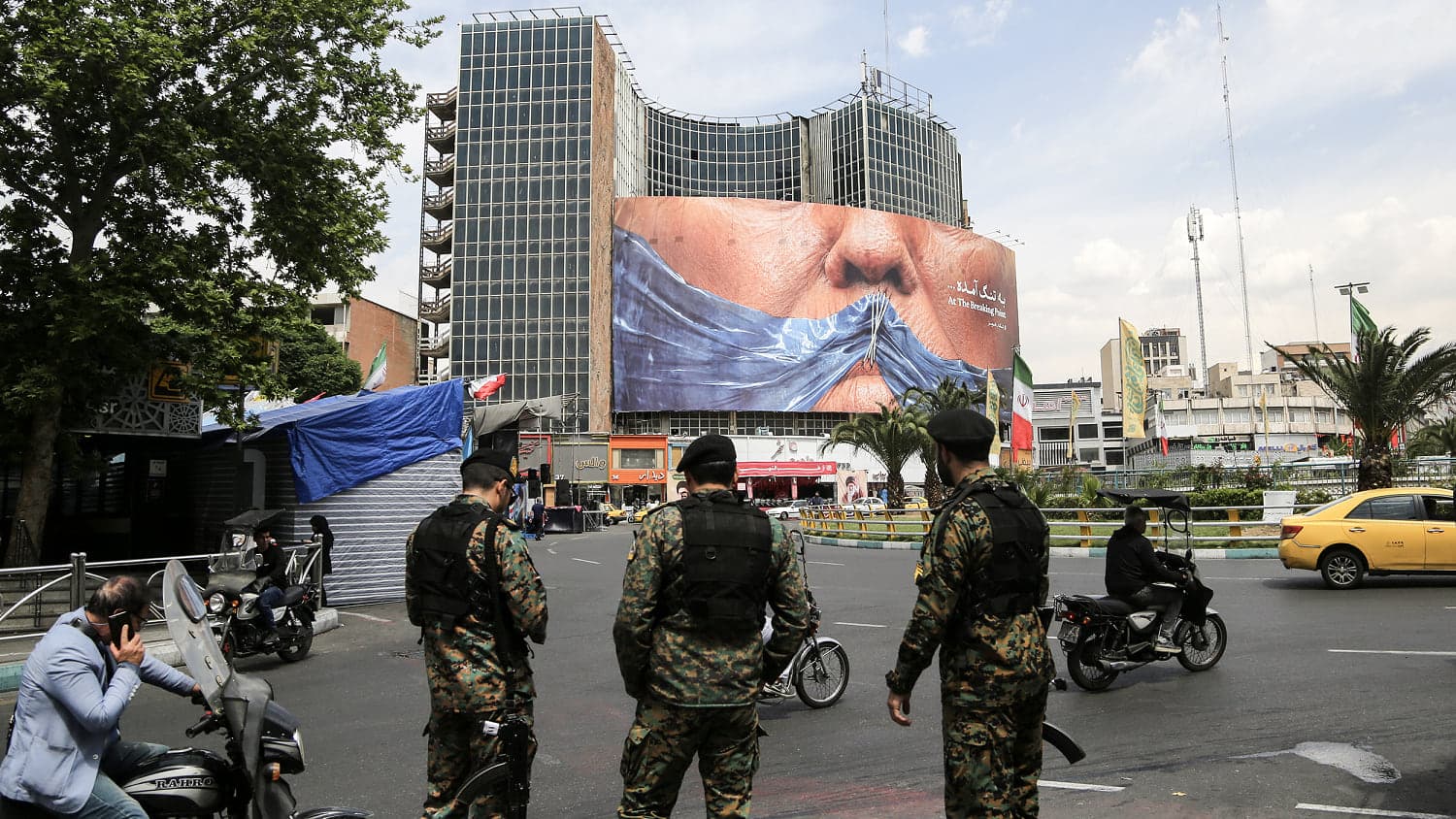 U.S. strikes at least two locations in Iran, American official says