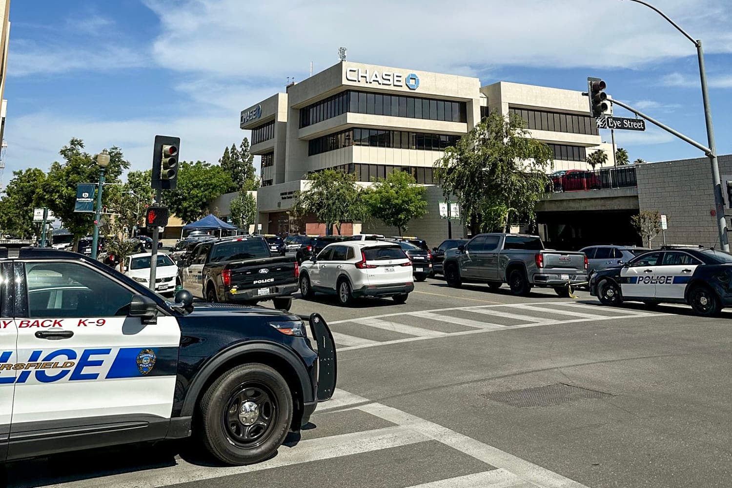 Man takes hostages at California bank as bomb threat prompts evacuations