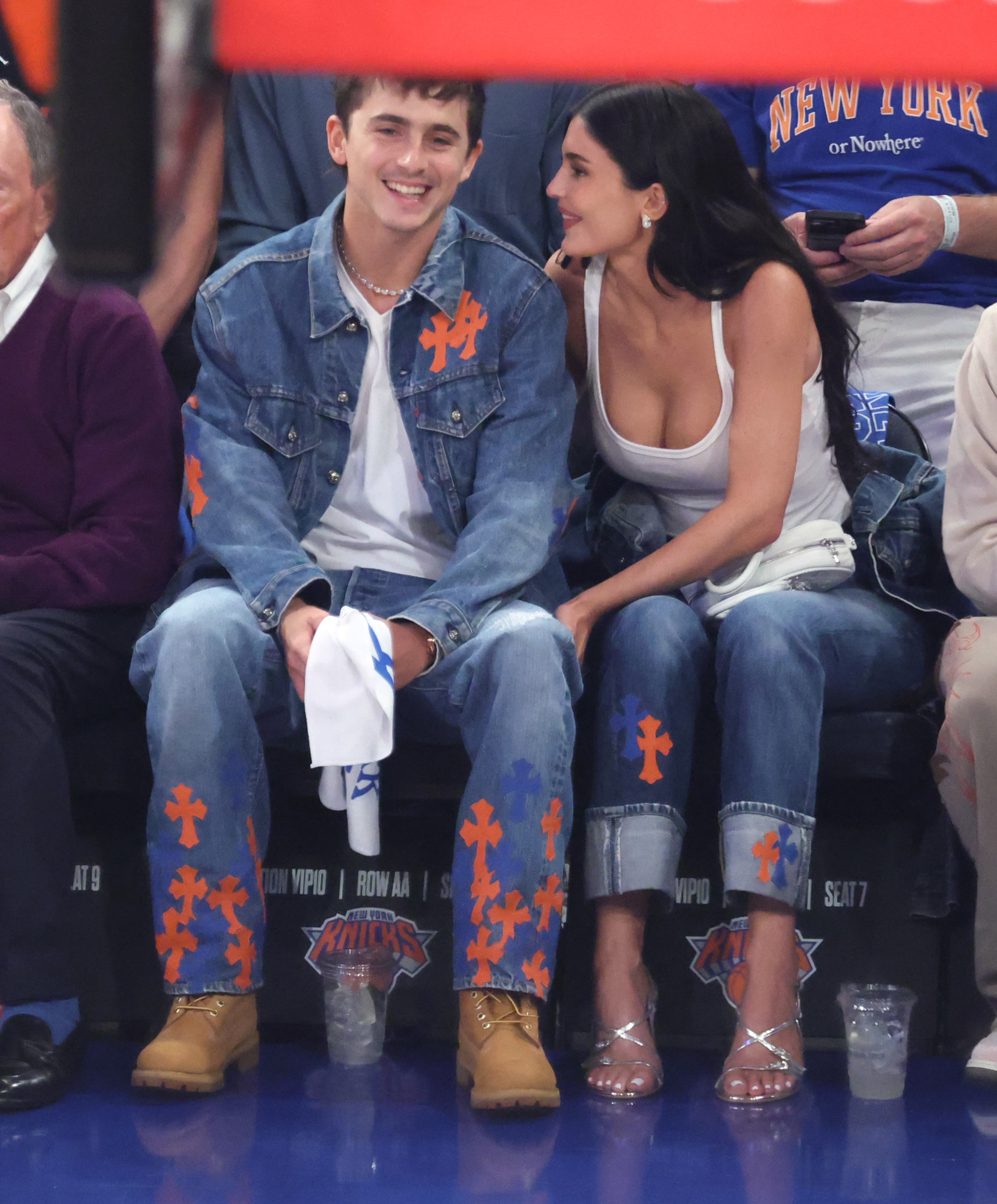 Timothée Chalamet rips off shirt, takes reporter’s mic in rowdy Knicks celebration as ‘proud girlfriend’ Kylie Jenner films him