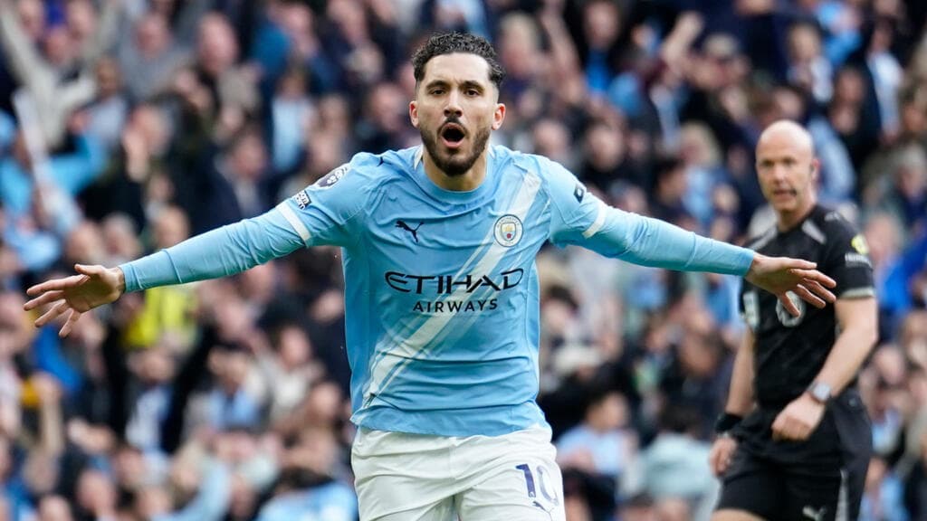 Manchester City beats Arsenal 2-1, reignites Premier League title race