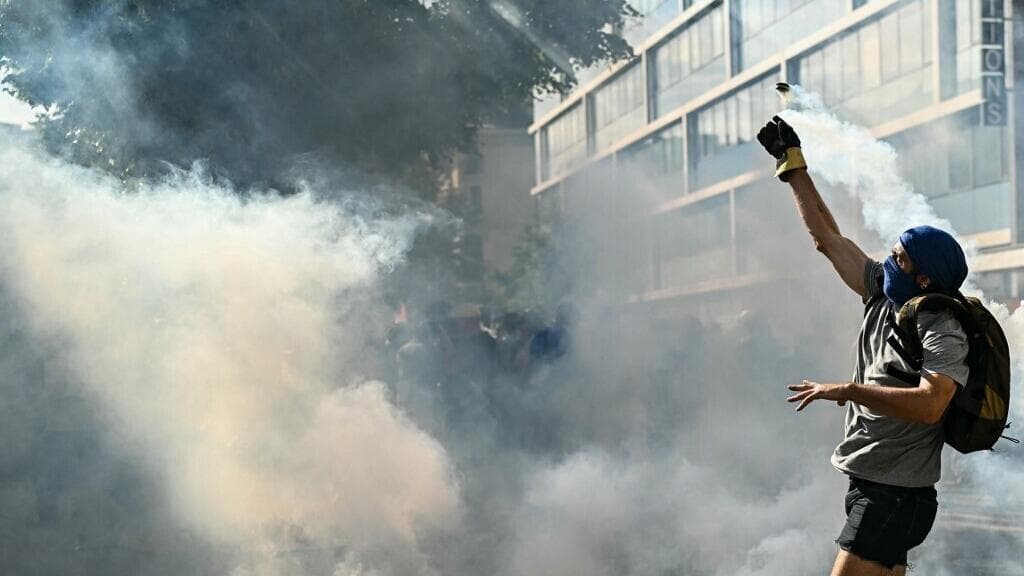 Swiss police fire tear gas as anti-G7 protesters target UN buildings