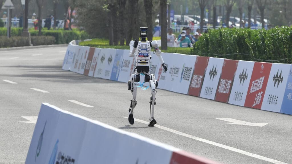 'New era': Humanoid robot outruns humans in Beijing half-marathon, beats world record