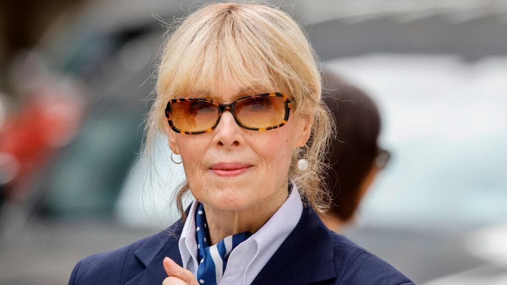 Justice Department launches probe into columnist who accused Trump of sexual assault, source says