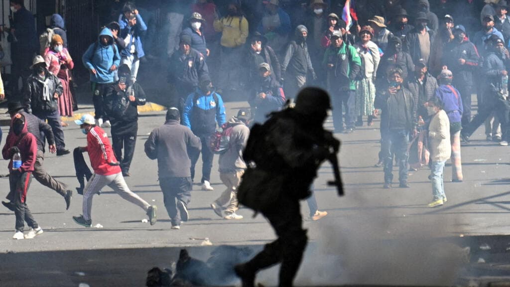 Bolivian leader's move to slash own salary fails to appease protesters in La Paz
