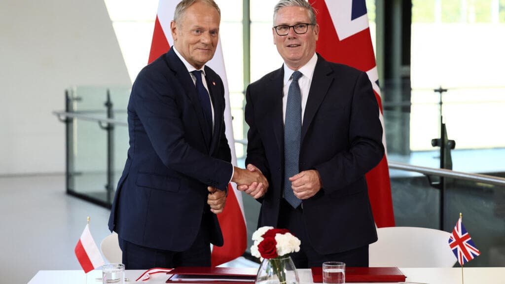 Starmer and Tusk sign UK–Poland defence pact amid warnings over Russian threats