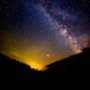 Farmers in a national park are turning down lights at night to help wildlife. It could be good for crops too