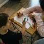 Preschoolers whose parents received coaching had fewer conduct problems, higher cognitive skills in middle school