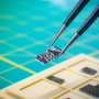 Stressed crystal creates nanoscale patterns on chip materials at room temperature