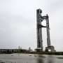Countdown glitch delays world's biggest rocket as SpaceX targets Friday retry