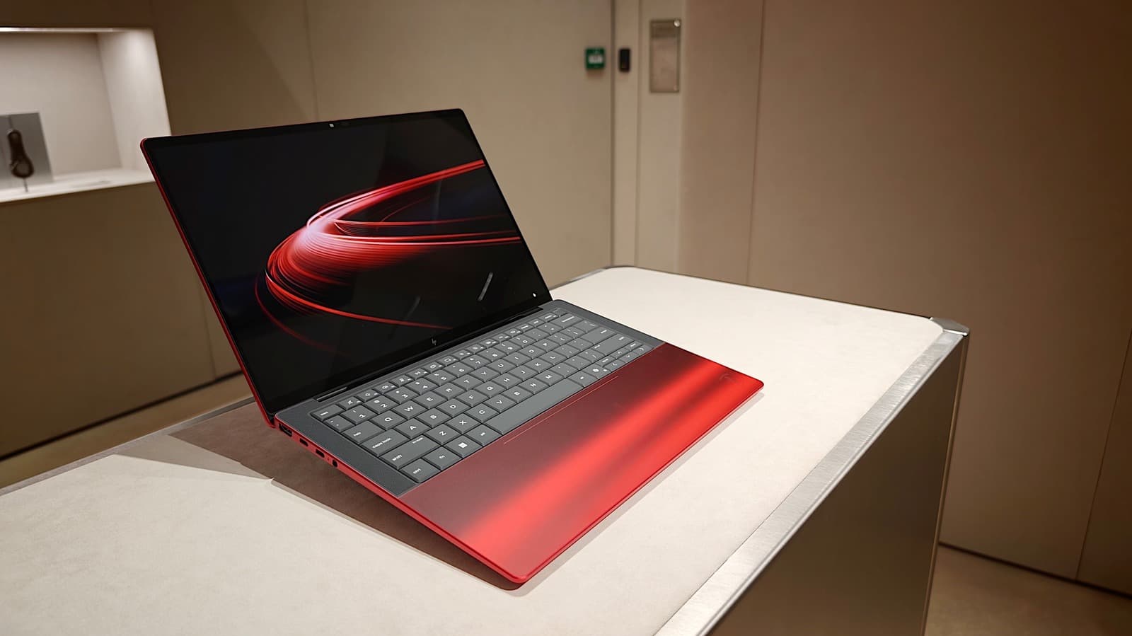 Ferrari and HP made a vivid red laptop with a transparent 'engine bay'
