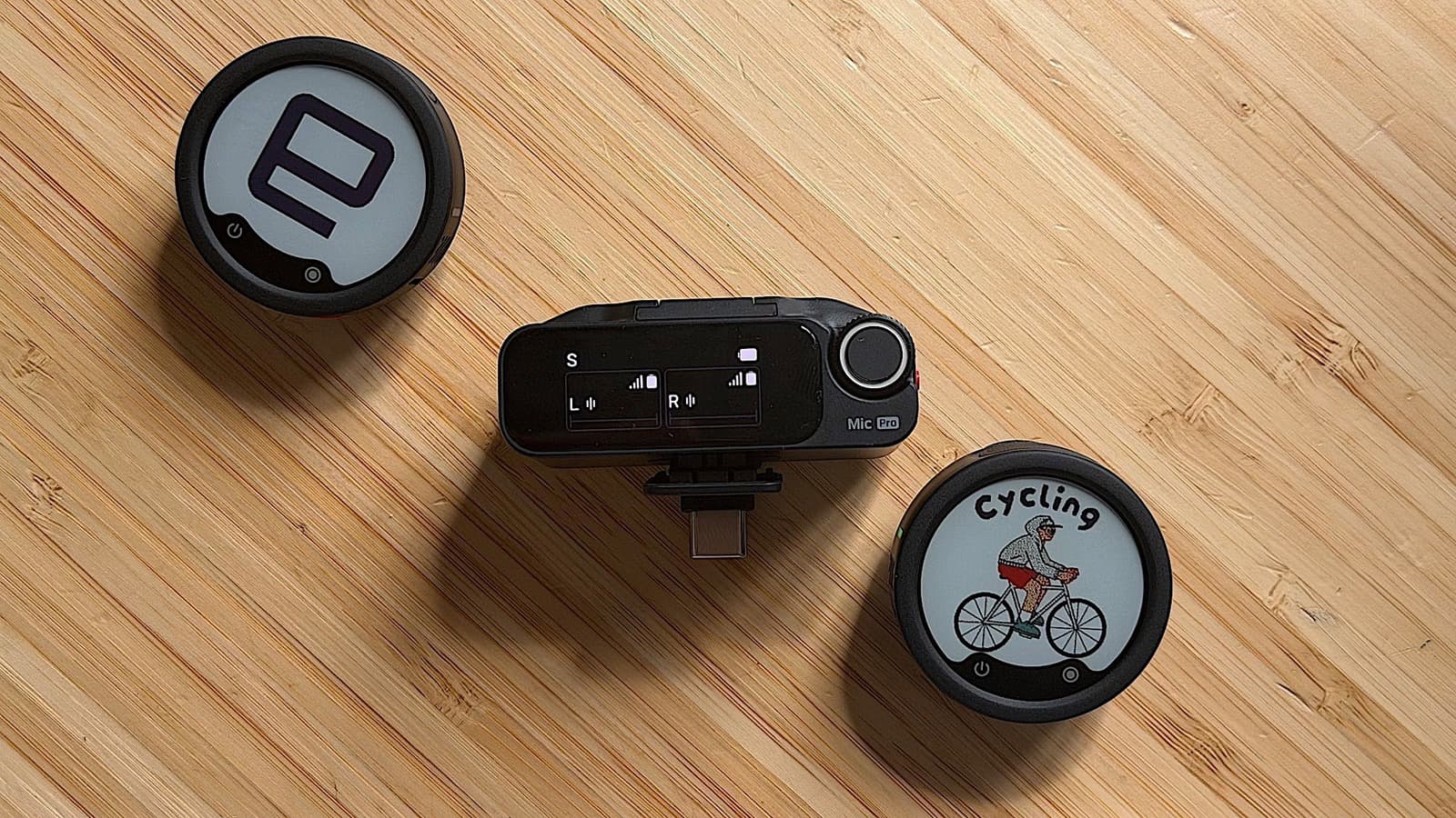 Insta360's Mic Pro has three built-in mics and looks like a chunky pin badge